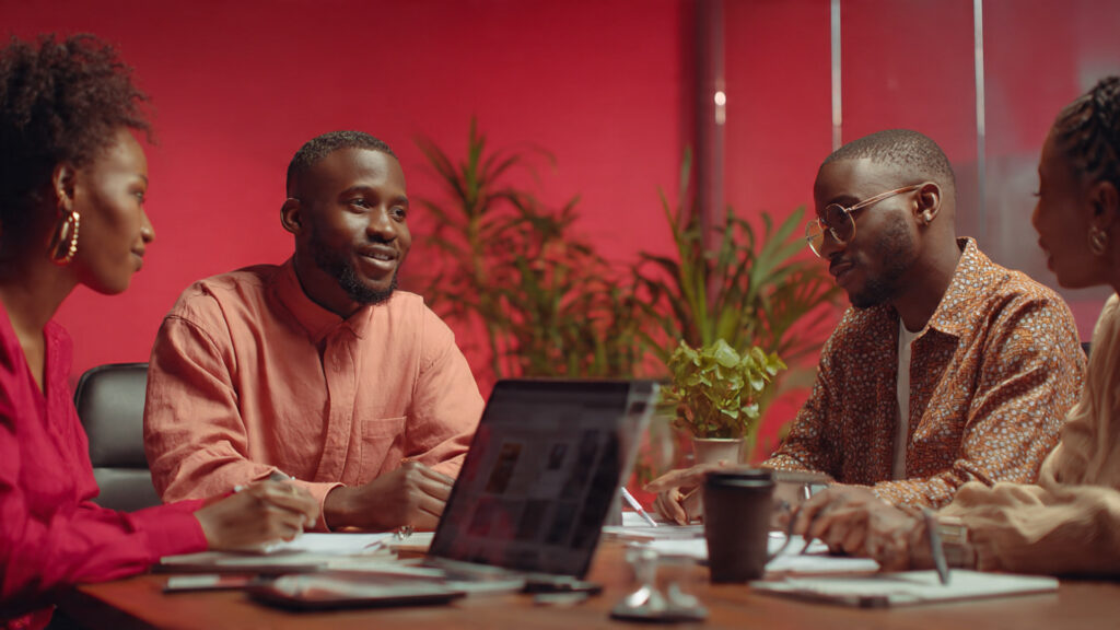 Nigerian entrepreneur reviewing website design company portfolio β choosing best web design agency Nigeria 2026